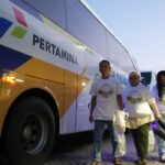Pertamina berangkatkan 900 pemudik arus balik ke Jakarta dengan transportasi massal yang hemat energi.